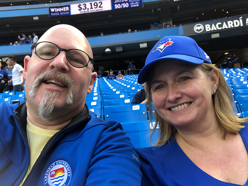 Mark and Karen at a Bluejays game showing their support
