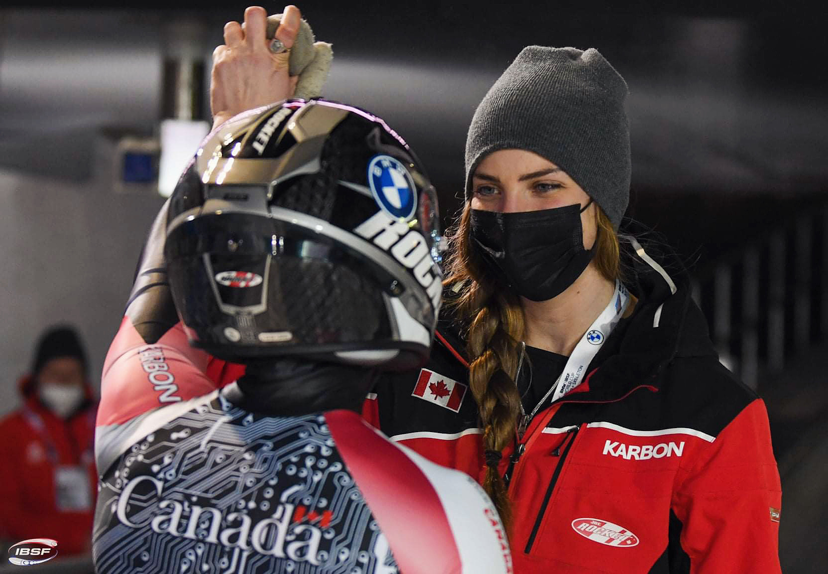 High fiving with teammate, Melissa Lotholz in Königsee, Germany, after Melissa finished a monobob race.