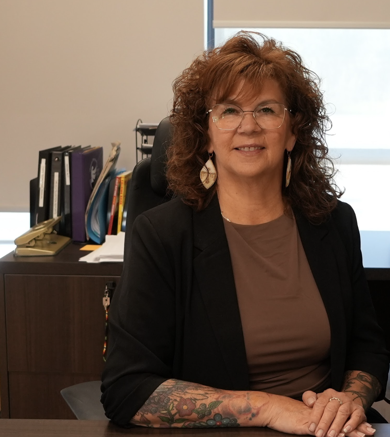 Chief Solomon at her Desk
