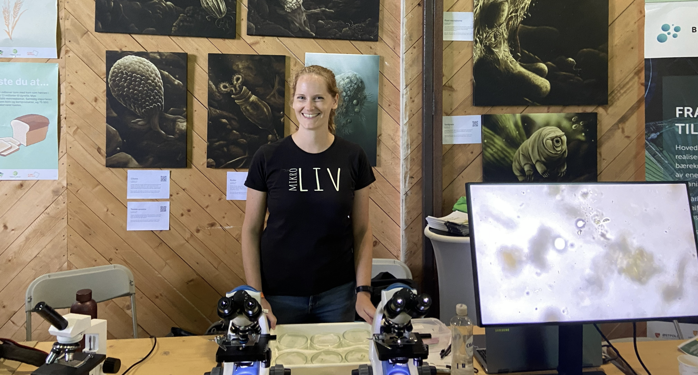 Kate Solbakk with scientific display