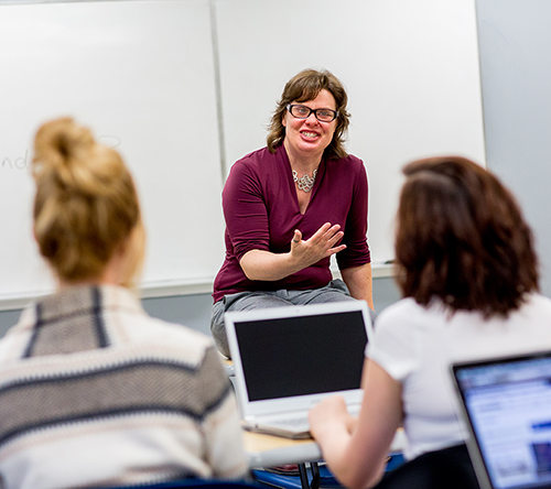 A professor and students during a class