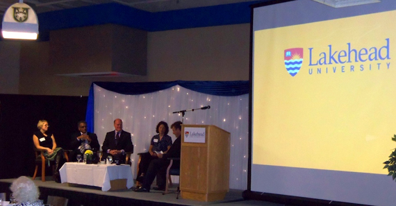  Our Thunder Bay campus's Report to Community was presented in a TV talk show format in front of a capacity crowd in the main cafeteria. (Left to Right:  Principal of Kakebeka Falls School, Heather Harris; Lakehead Psychology Professor, Dr. Ed Rawana; Paterson Foundation President & CEO, Don Paterson; Nordic Ski Team member and first-year NOSM student, Daphne Haggarty;  and Lakehead President, Dr. Brian Stevenson, who hosted the event.)