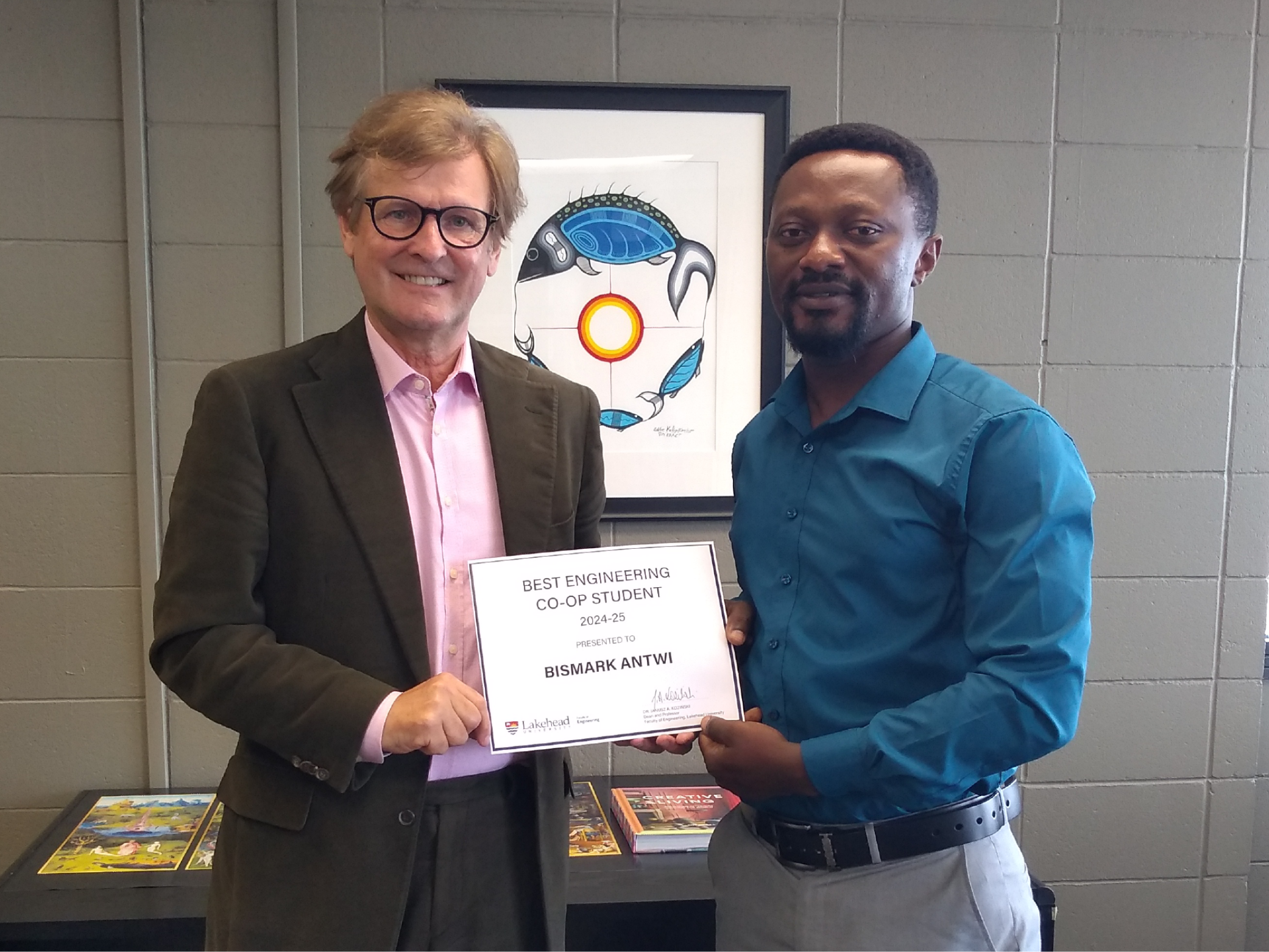 bismark-coop-award Bismark Antwi receives the co-op award from Dean Kozinski