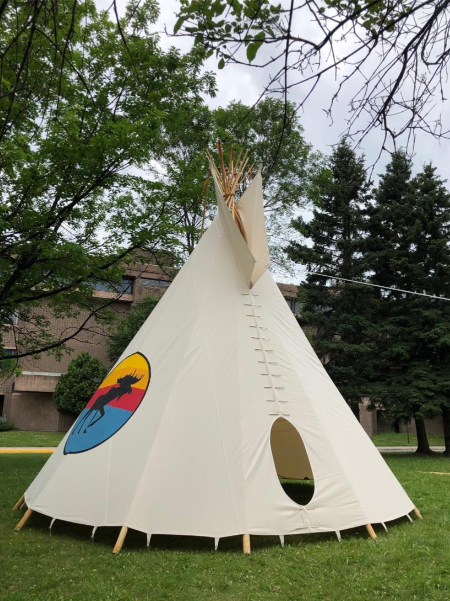 Tipi stands outside the Agora Circle