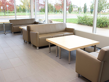 Couches and tables placed at social distanced measures for COVID
