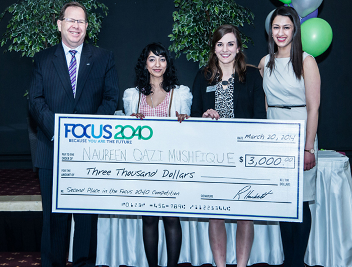 Naureen Mushfique, second from left, was presented with a cheque for $3,000 by Terry Erb, Director of Sales for Ford Motor Company of Canada (far left), Heather LoPresti, co-chair of Focus 2040 and on the far right, Julia Piccioni, co-chair of Focus 2040.  
