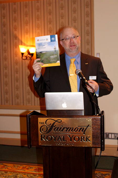 Dr. Peter Hollings holds a copy of the report while at the Prospectors and Developers Association of Canada’s annual conference in Toronto
