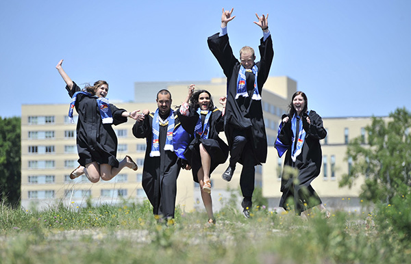 Lakehead University graduates celebrate following the 2015 Convocation today in Orillia.