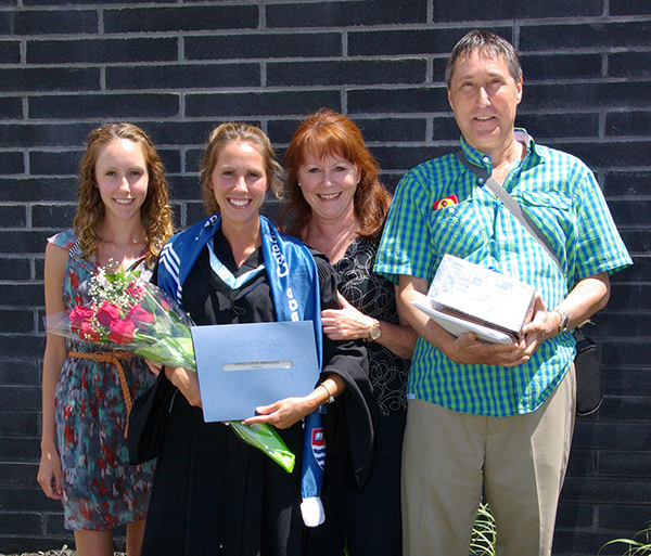 Lakehead University award-winner, Olivia Manovich, celebrates her accomplishments at the June 2014 convocation with her family – sister Simone, and parents Linda and Brian.