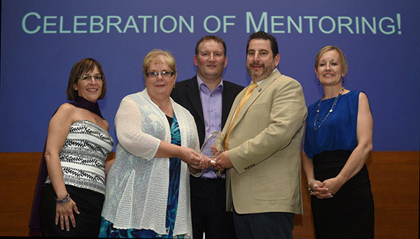 Lakehead University Orillia was awarded the Scholastic Partnership Award by Big Brothers Big Sisters of Canada for their exceptional partnership with the Orillia branch, which involved Lakehead student volunteers in the agency’s school-based programs.  The award was accepted last month in Toronto by Lakehead’s Marian Ryks-Szelekovszky, Vice-Provost, Student Affairs, and Frank Cappadocia, Associate Vice-President, Lakehead Orillia. Also celebrating the award are Karen Shaver, Interim CEO, BBBS Canada (l), James Maxwell, Executive Director, BBBS Orillia; and Marilyn Watson, Chair, BBBS Orillia Board of Directors.