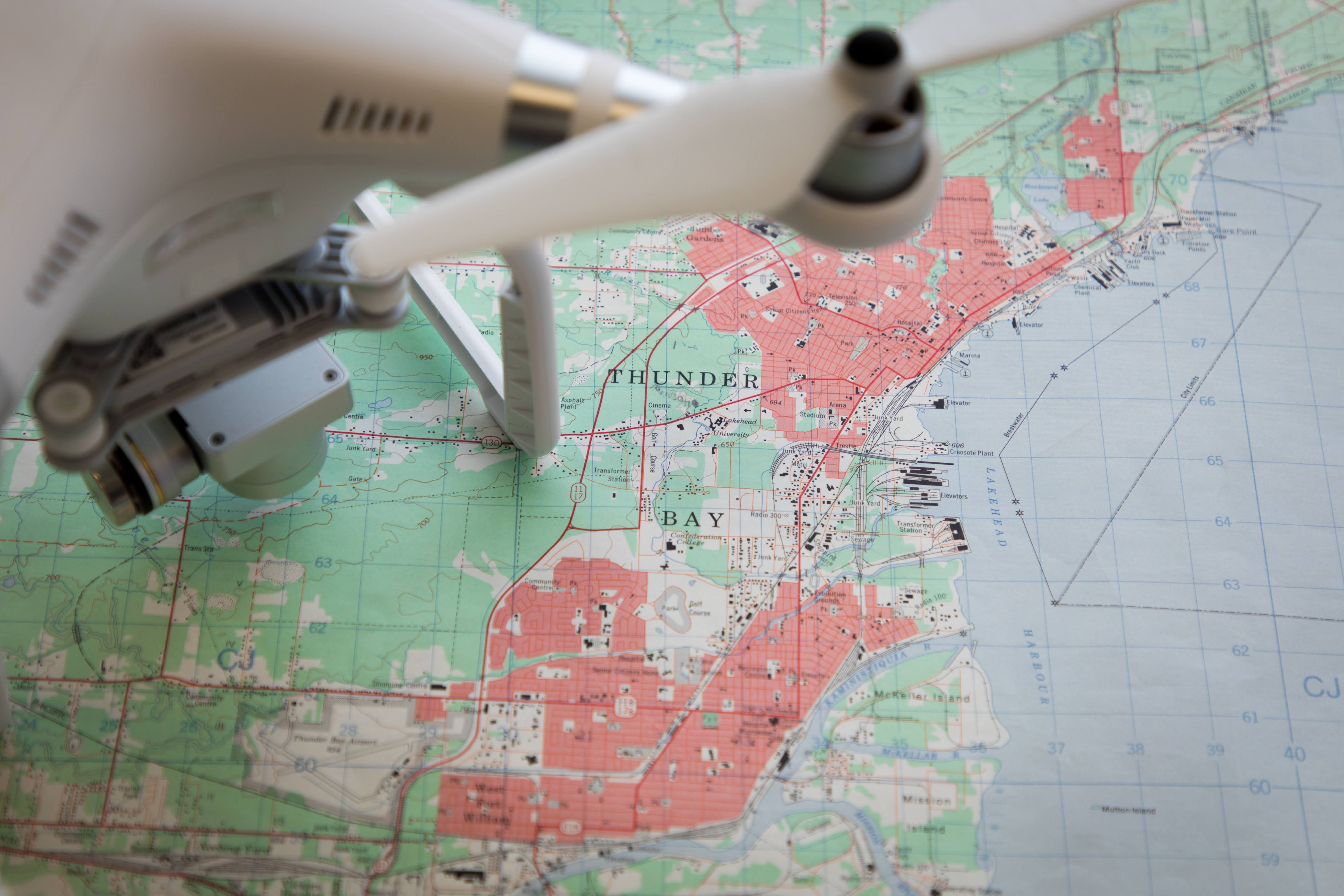 Aerial drone sitting on map of Thunder Bay district