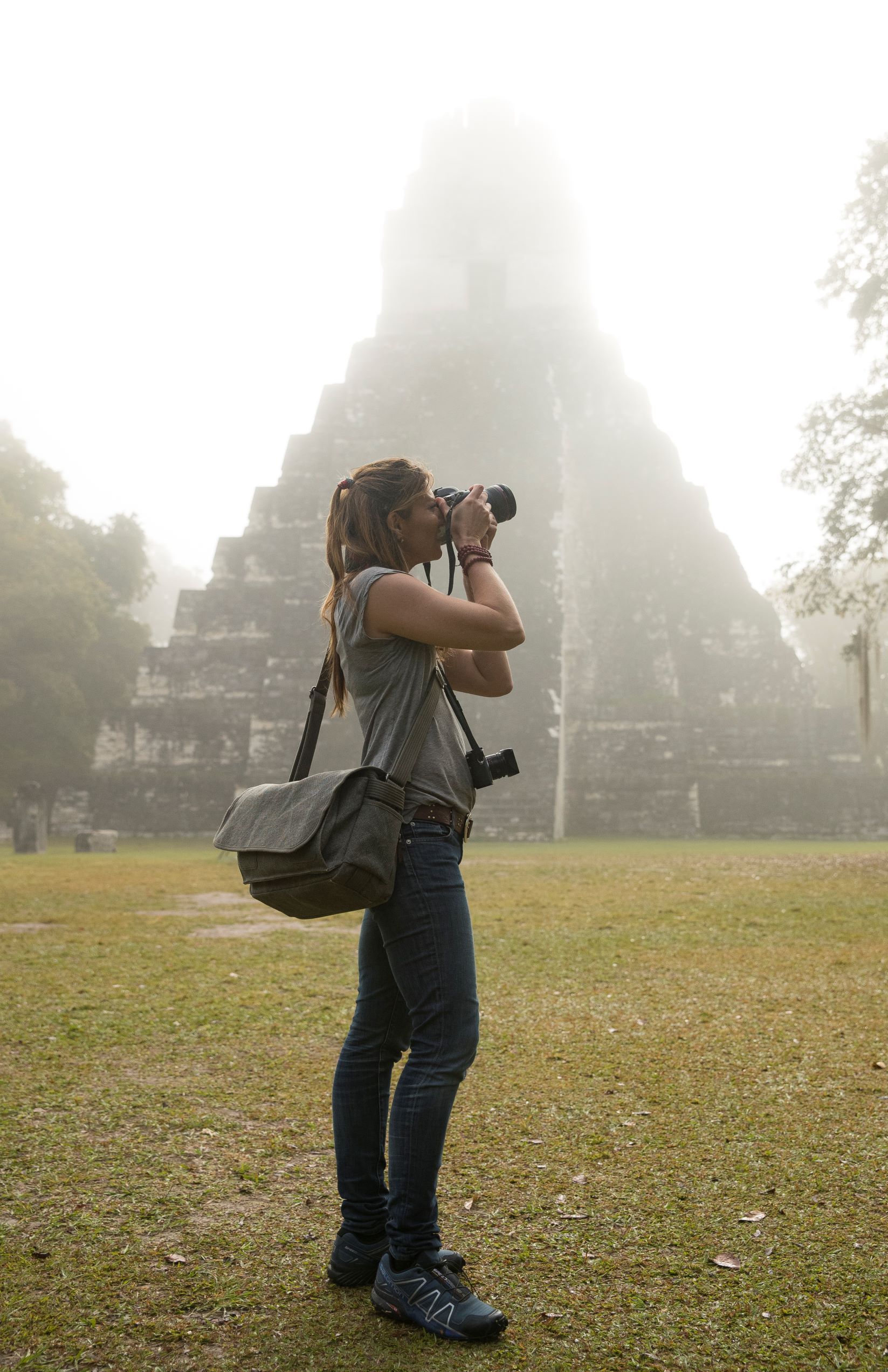 Jody taking photos near a Mayan temple