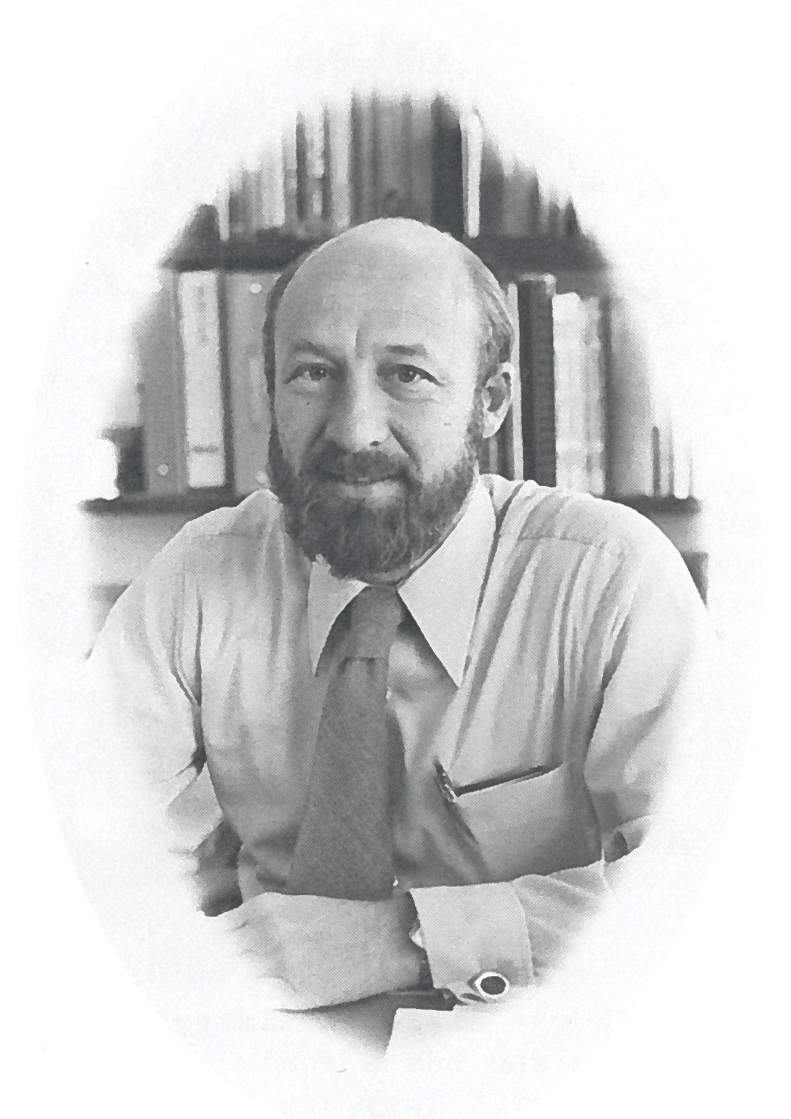Dr. Manfred Kehlenbeck Black-and-white photo of Dr. Manfred Kehlenbeck in his office