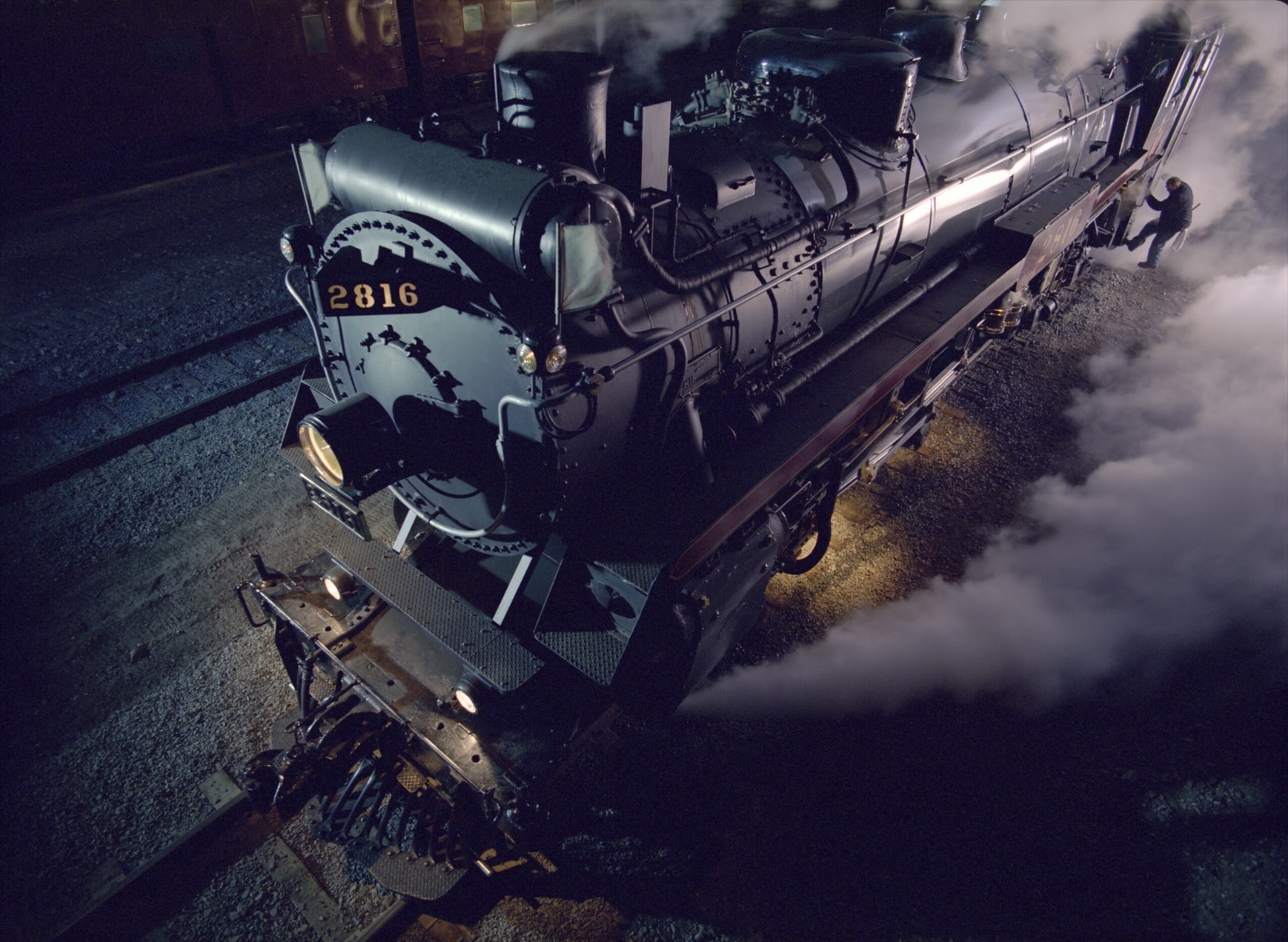Rocky Mountain Express Steam Engine Rocky Mountain Express steam engine at night with steam billowing from it