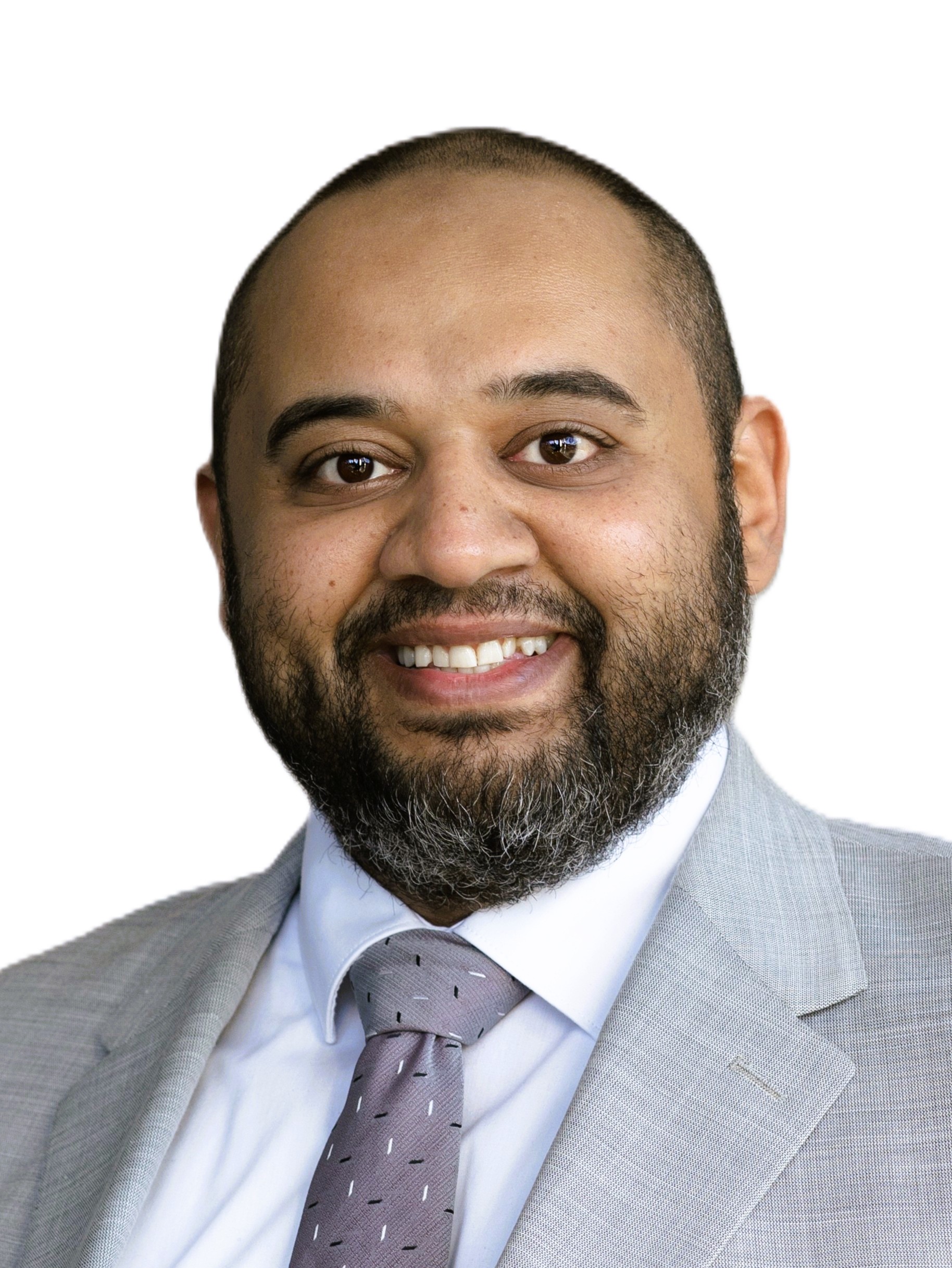 Dr. Ahmed Elshaer wearing a jacket and tie