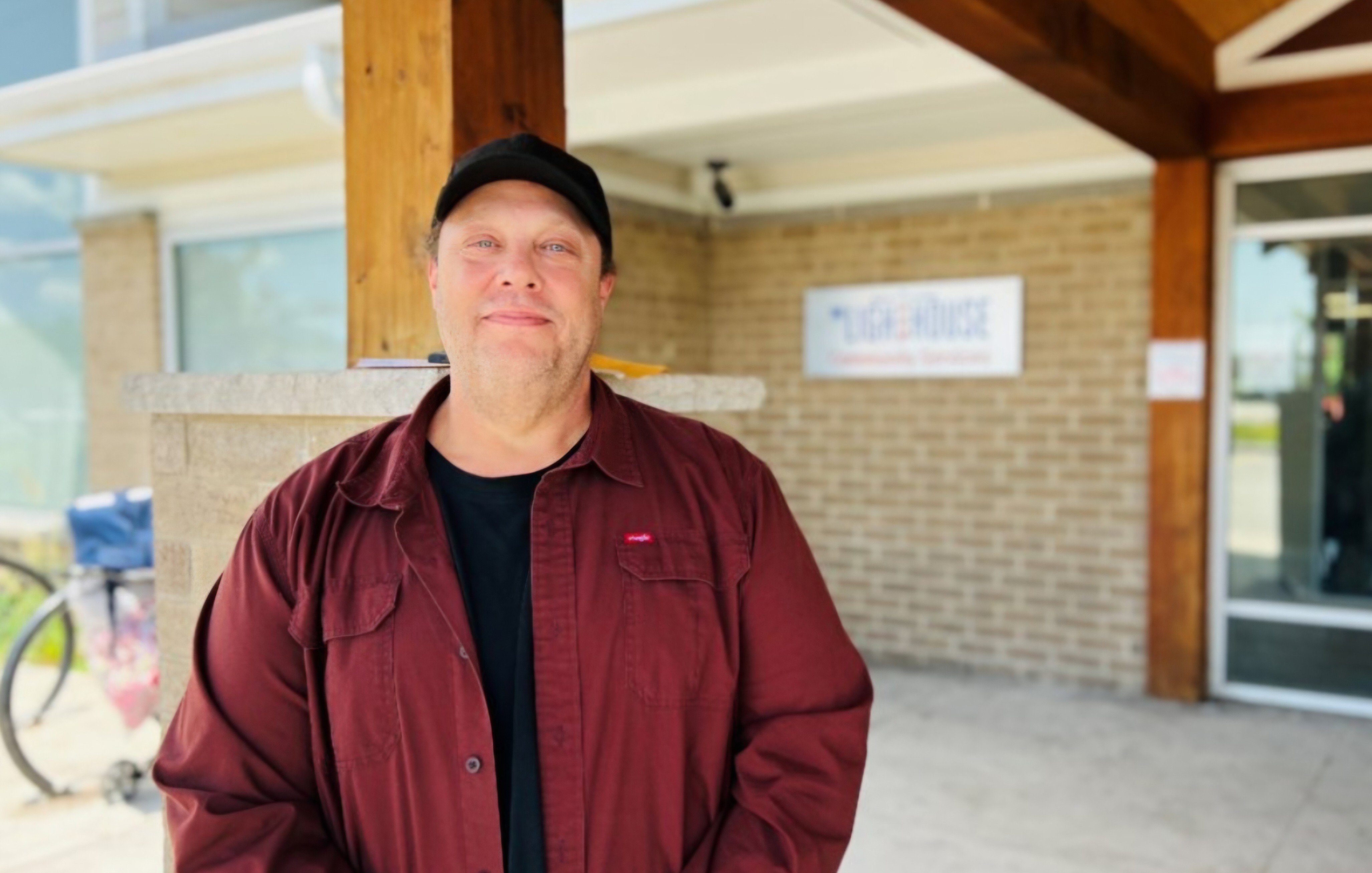 John Mulloy at The Lighthouse John Mulloy stands outside The Lighthouse building on a sunny day