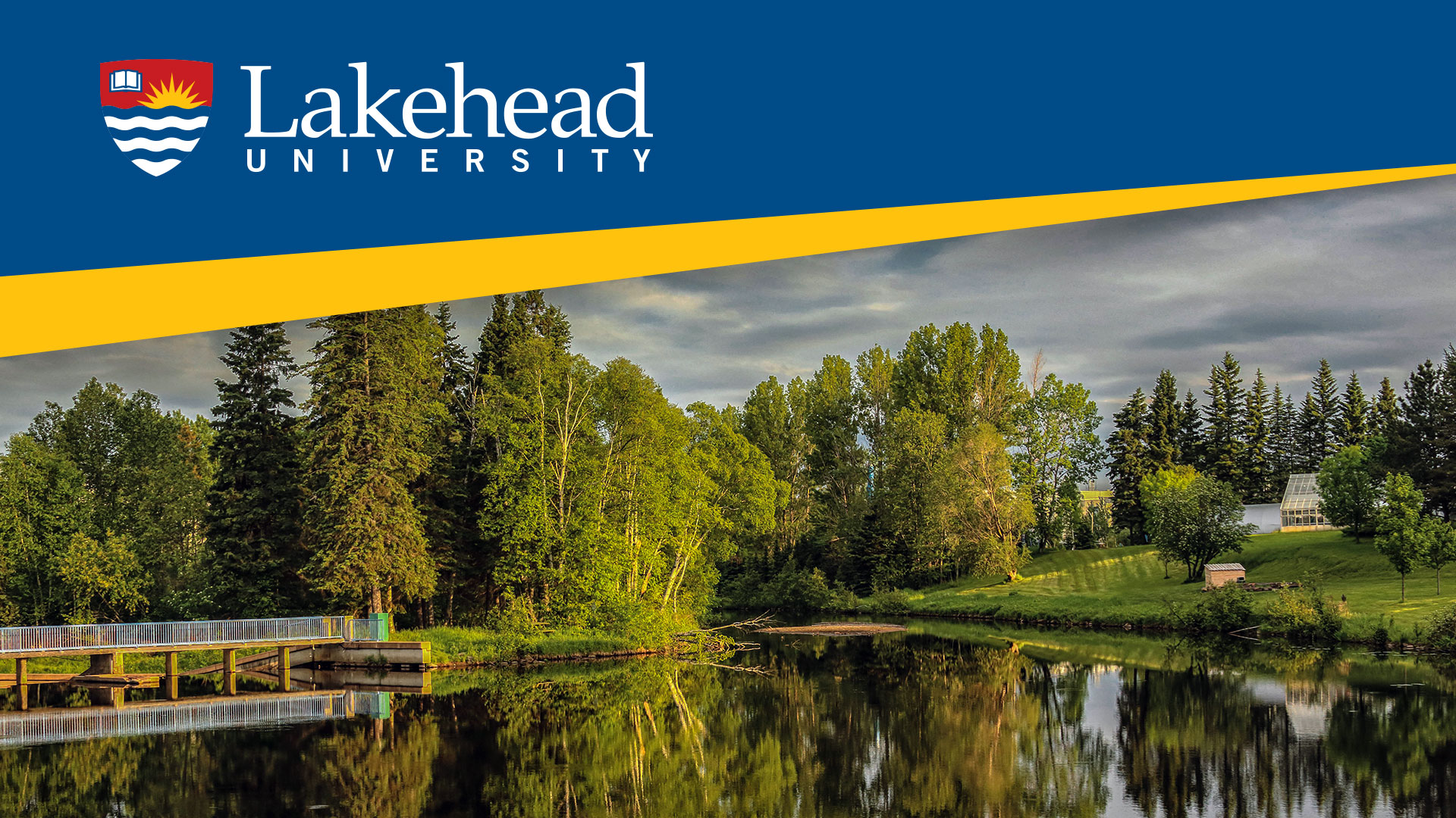 A photo of Lake Tamblyn on Thunder Bay campus featuring the Lakehead University logo