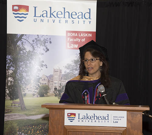 Dean EagleWoman addressing class