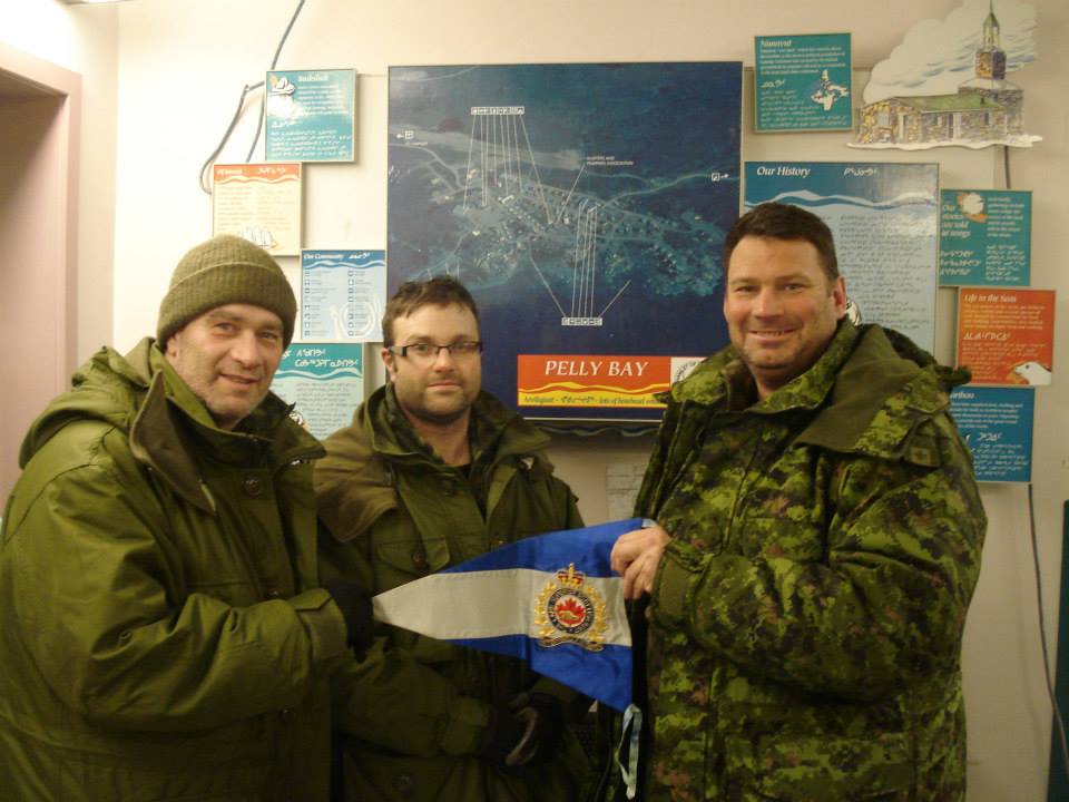 Lakehead alumni Major David Ratz, Captain James Meredith and Lieutenant Colonel Geoff Abthorpe in the Kugaaruk airport, also formerly known as Pelly
