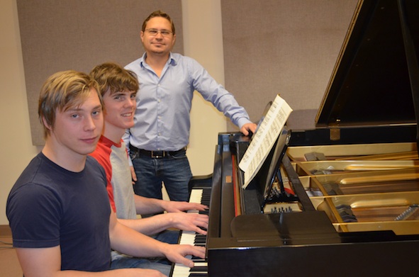 Students playing the piano