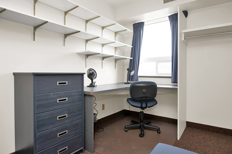 An alternate angle displaying the desk and shelving